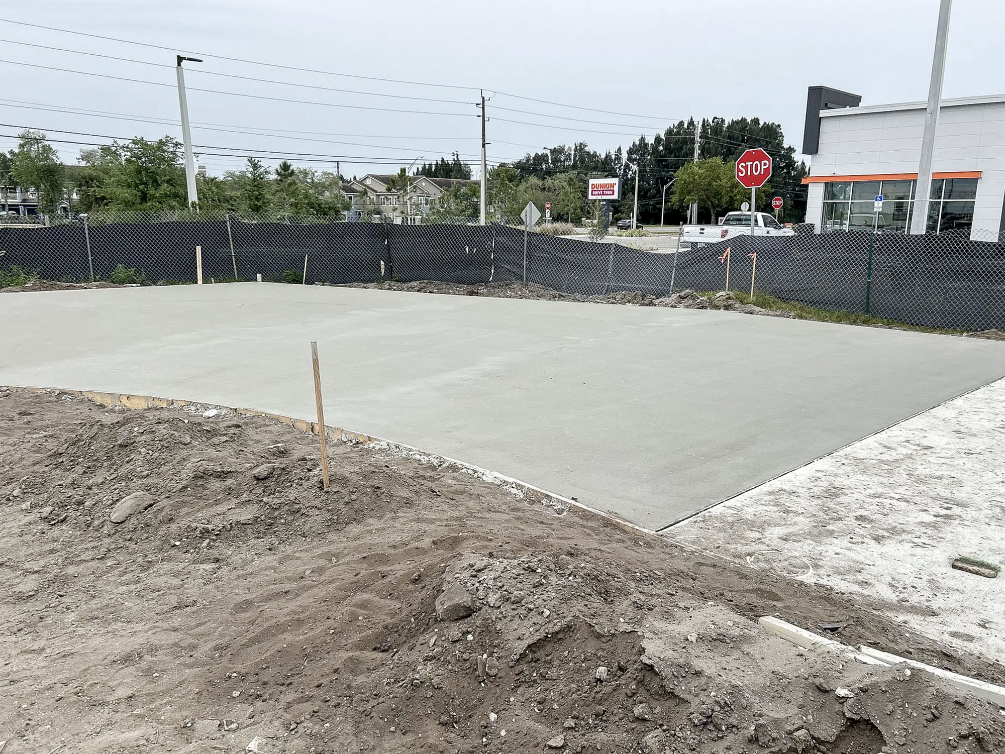 Fresh concrete slab on Ameriteam's Semoran car wash jobsite