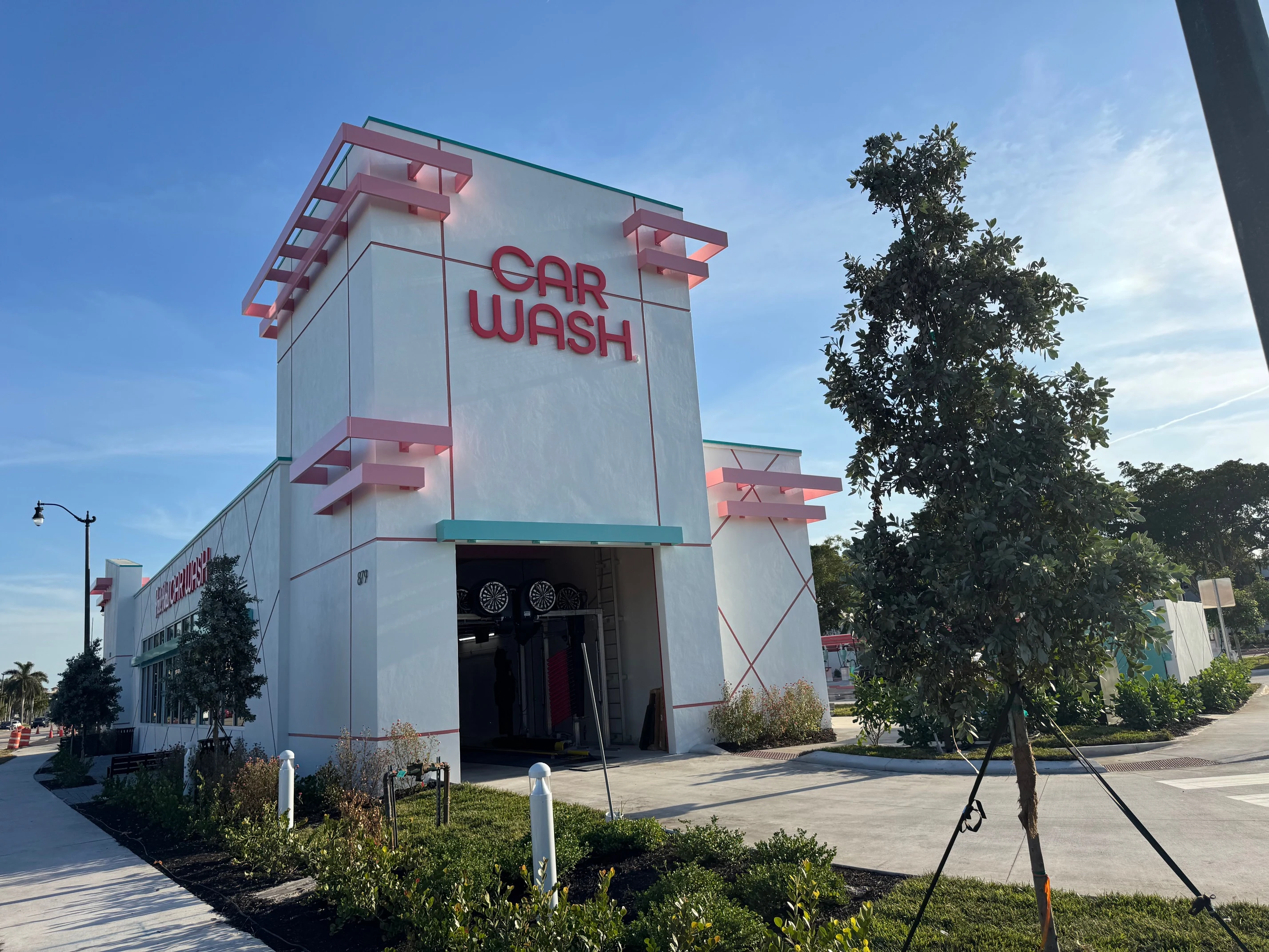 Entry view of Pink Bird Car Wash in West Palm Beach, Florida