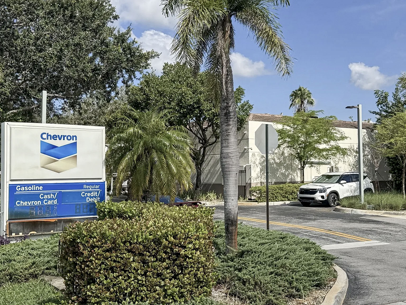 Chevron monument sign, landscaping, and site access